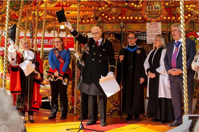 The official opening of the May Fair, with Boston Mayor, Coun Anne Dorrian, right, and mace bearer Andy Lamming holding out their hats.