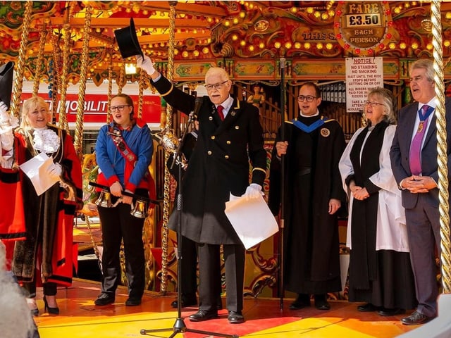 The official opening of the May Fair, with Boston Mayor, Coun Anne Dorrian, right, and mace bearer Andy Lamming holding out their hats.