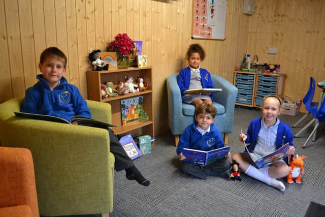 Pupils enjoying the new room and resources