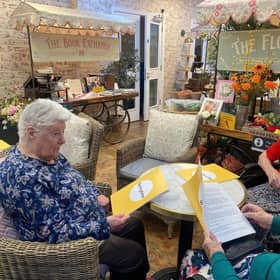 Residents enjoying weekly book club | Milford Care
