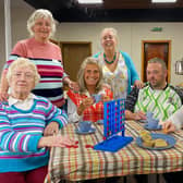 Enjoying some tea and biscuits at Trusthorpe village hall's warm space. Photo: Chris Frear