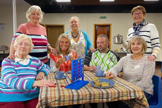 Enjoying some tea and biscuits at Trusthorpe village hall's warm space. Photo: Chris Frear