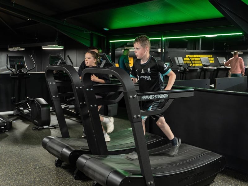 Some of the younger attendees having a go on the treadmills.