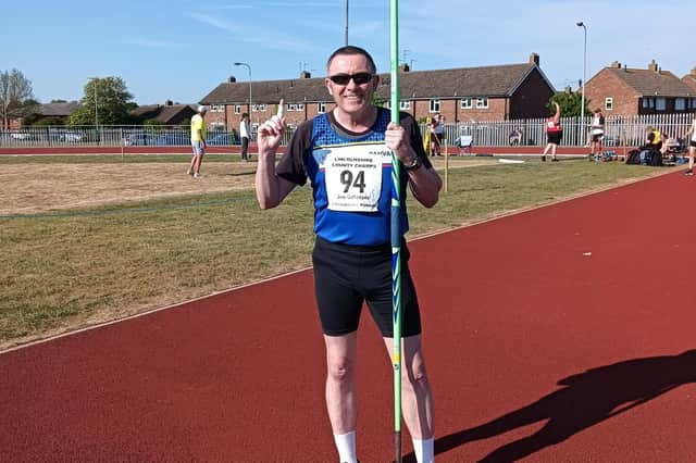 Jim Gillespie celebrates his success in the javelin.