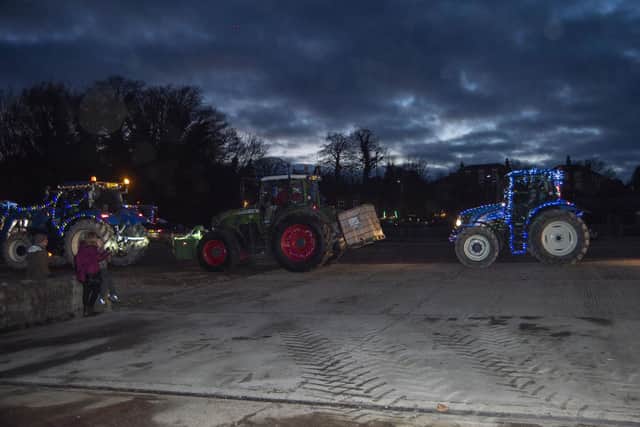 The Tractor Run heads out of town.