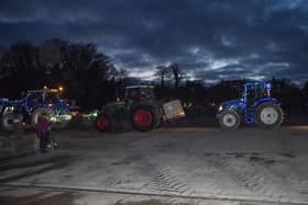The Tractor Run heads out of town.