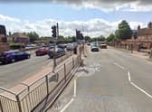 The pedestrian crossing on John Adams Way set to be upgraded. Photo: Google Streetview.
