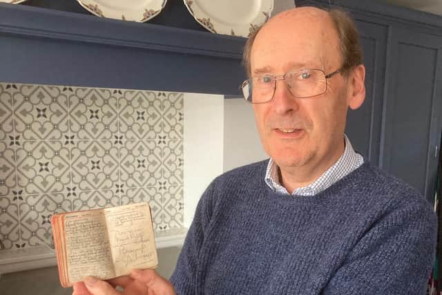 Chris Mattocks with the diary of Boston soldier William P. Tredinnick, which he found amongst his late grandfather's possessions in a loft.