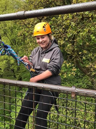 Hayley during her 80ft abseil for the Lincs & Notts Air Ambulance.