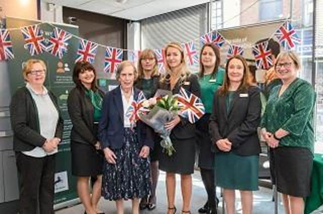 Barbara Brearley, aged 84, from Hagworthingham with Lloyds staff.