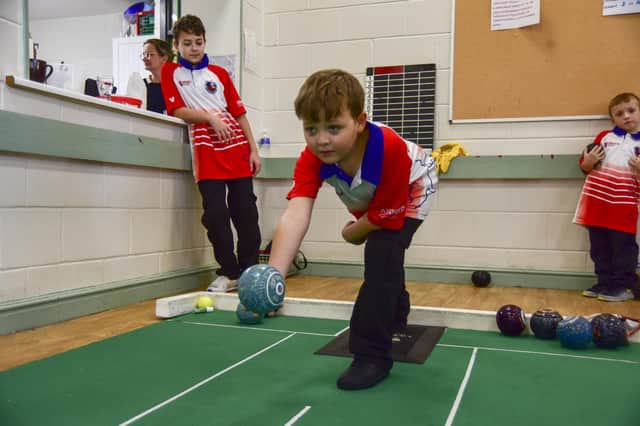 Young England short mat bowler, Thomas England, age 10. Photo: Holly Parkinson