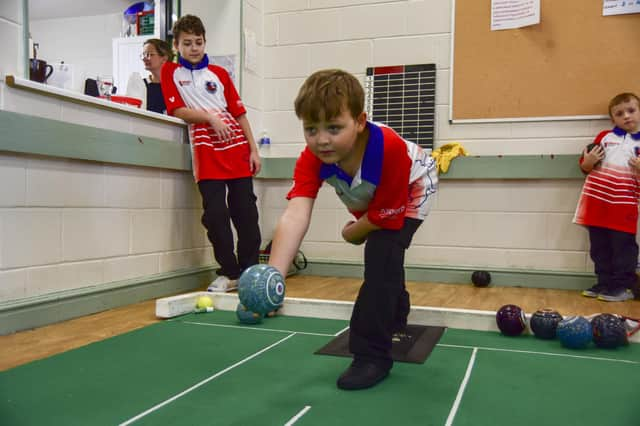 Young England short mat bowler,  Thomas England, age 10. Photo: Holly Parkinson