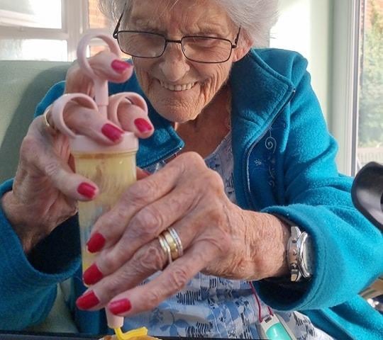 Freda Sylvester decorating cakes at Syne Hills Care Home in Skegness.