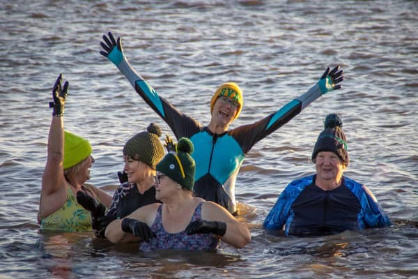 Members of the Wild at Heart Group taking the plunge in the sea at Skegness on New Year's Day.