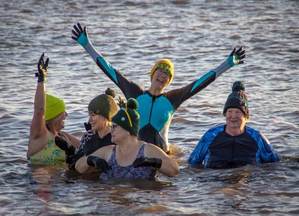 Members of the Wild at Heart Group taking the plunge in the sea at Skegness on New Year's Day.