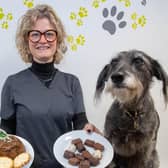 VetPartners vet Honor Etherington with Pixie and treats that are toxic to pets.