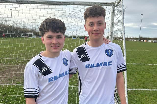 Louth debut-maker Oscar Davey, 16, on the right with older brother and team mate Owen on Saturday.