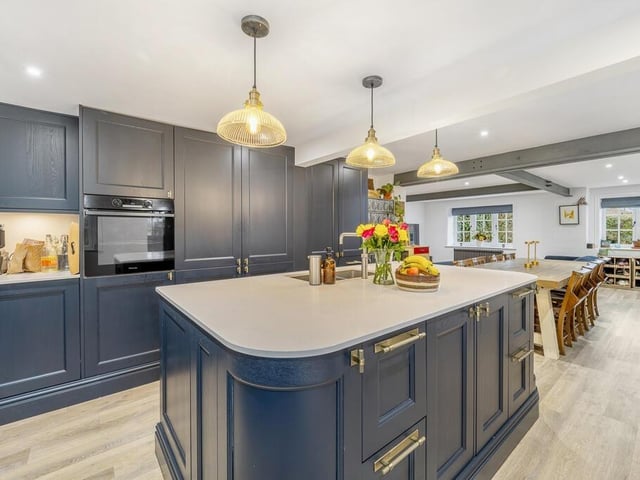 Another angle on the kitchen and the open-plan area.