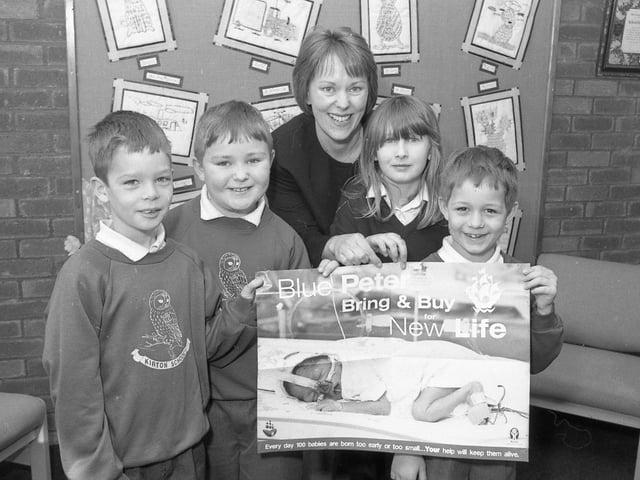 Kirton Primary School lending its support to Blue Peter's Bring and Buy For New Life campaign. The school raised £237 for the appeal, which aimed to supply urgently needed equipment to special care baby units all over the UK. Pictured (from left) are Ashley Lennon, William Green, Laura Brown and Adam Kelk, with school secretary Carolyn Green.