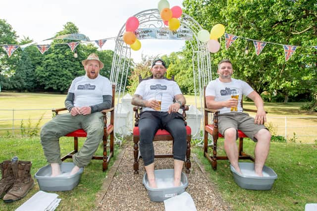 Mark Stones, Jason Maltby and Stacey Whitworth resting after the Filey to Priory walk.