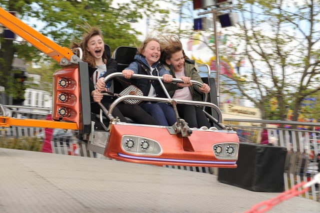 Nicola Cox, Bethany Woods and April Martin, all aged 12, enjoying the Boston May Fair of 2014.