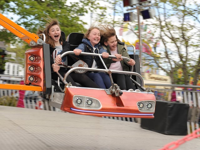 Nicola Cox, Bethany Woods and April Martin, all aged 12, enjoying the Boston May Fair of 2014.