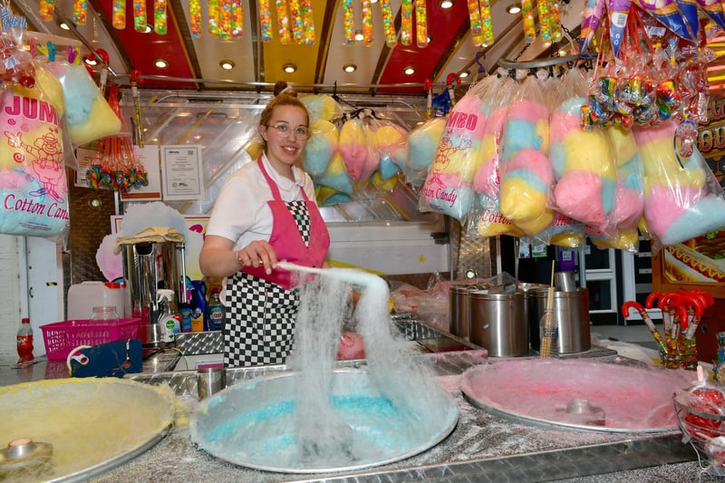 Melainie Wynn prepares some candy floss on the sweets stall.