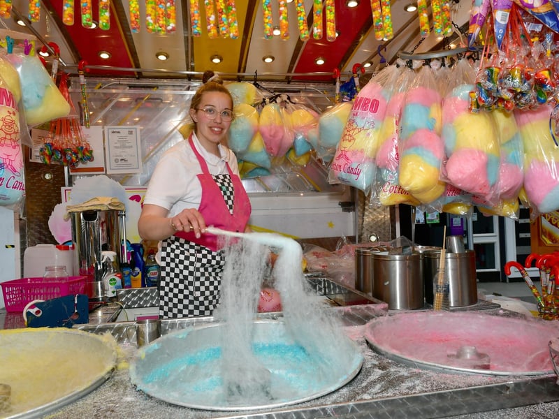 Melainie Wynn prepares some candy floss on the sweets stall.