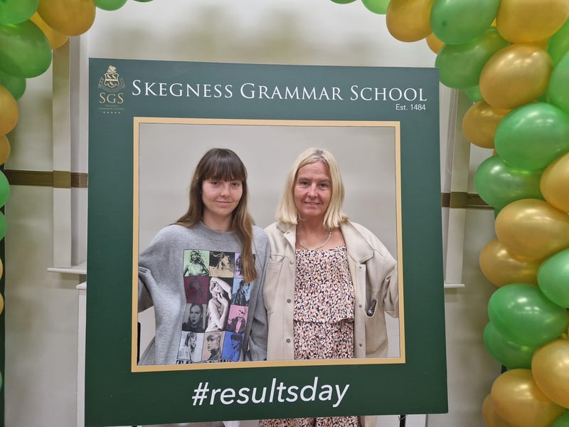 Tia Atterby celebrating achieving three A's with her mum, Shelley.