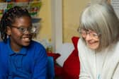 Schoolreaders Volunteer Supporting a Child With Their Reading