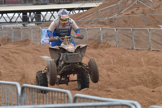 Quad bikes and side car race