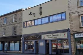 A fresh look enables these Market Place properties to better fit in with their older neighbours.