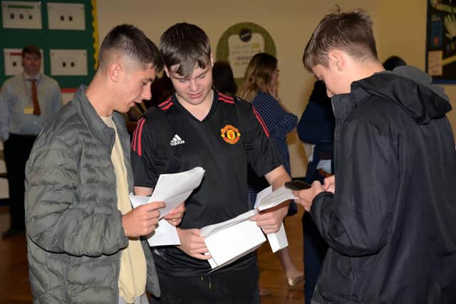 Students open their results at Louth Academy.