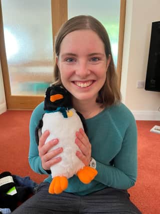 Clare with her mascot Gordon.
