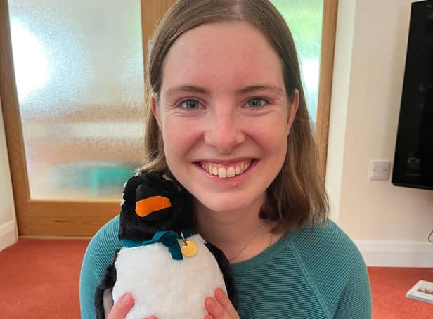 Clare with her mascot Gordon.