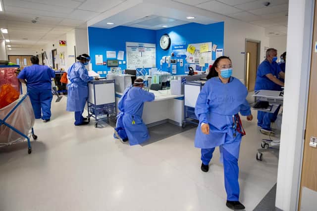File photo dated 20/10/20 of staff on a hospital ward. Patients will suffer due to shortfalls in the number of NHS doctors and nurses, health leaders have warned. The NHS is "flying blind" over future staffing needs and a lack of planning will mean that waiting times will increase and standards of care will slip, leading medics have said. Issue date: Tuesday March 29, 2022.