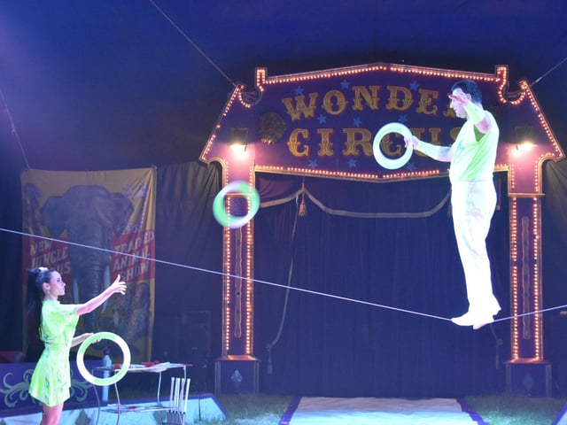 A wire walker at the Wonder Circus.