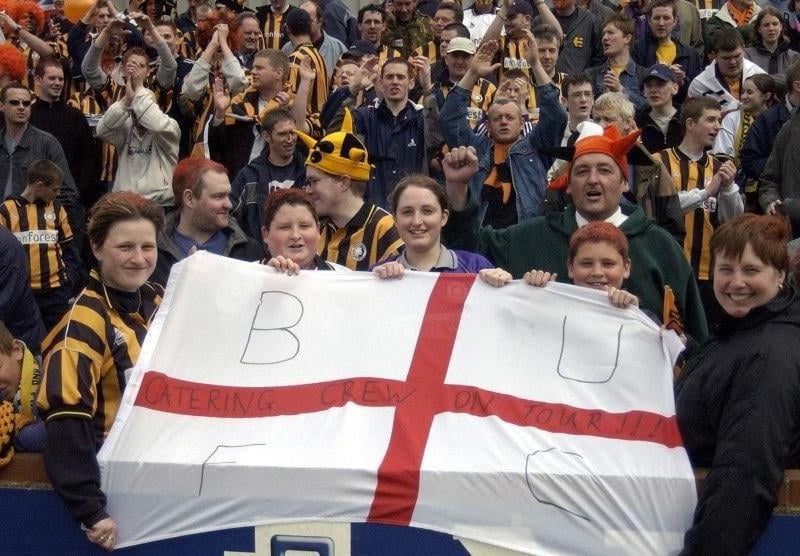Supporters fly the flag for United.