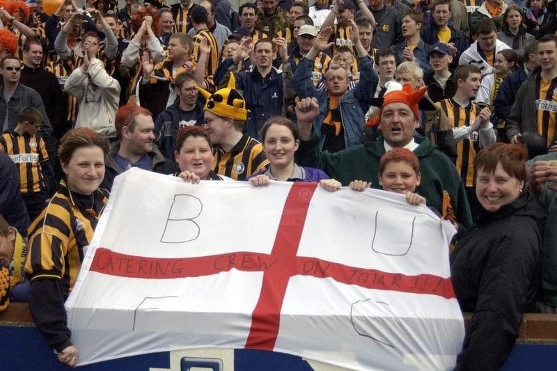 Supporters fly the flag for United.