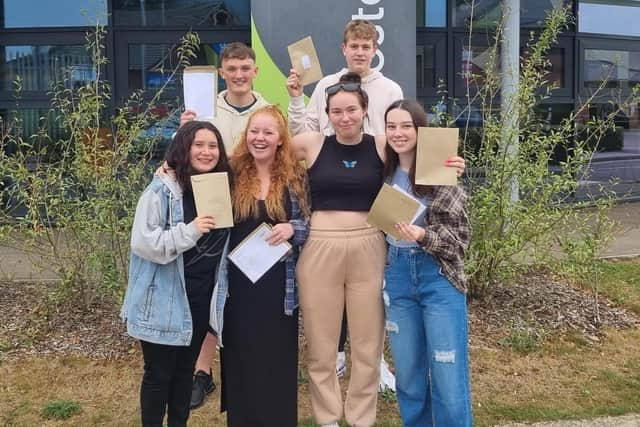 Boston College students celebrating their results.