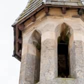 The cemetery chapel spire.