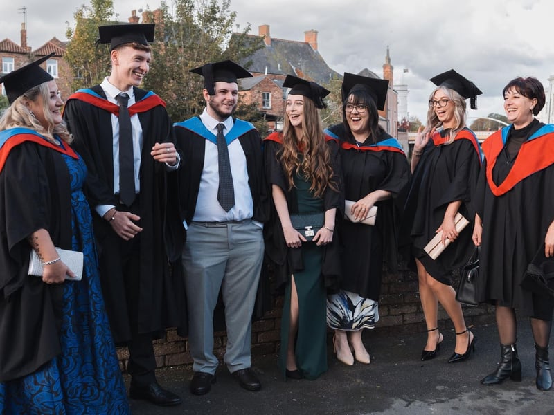 A relaxed moment before the ceremony gets under way, near Boston College's Sam Newsom Centre.