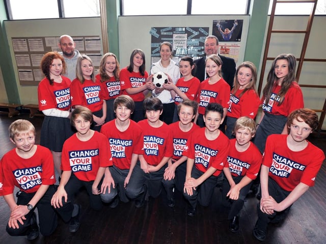 England women’s football captain Casey Stoney with pupils at Monks’ Dyke Tennyson College, in Louth, 10 years ago.