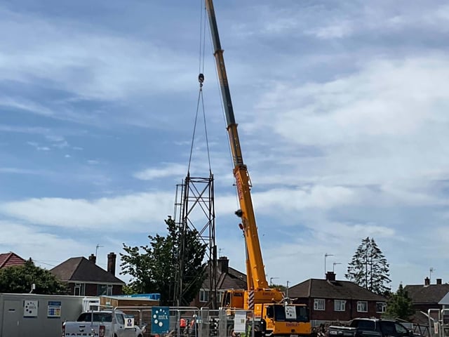 A partially dismantled floodlight.