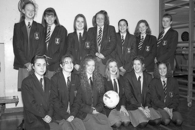 Two netball teams at Giles School, Old Leake, had cause to celebrate in early 1994. Both the under 16 and 15 teams came third in the HSSF tournaments at Boston High and Spalding High. Both were awarded the newly-created trophy for winners of the mixed schools' section. Under 16 team members were: Vicky Marshall, Vicky Young, Julie White, Lyndsey Wood, Fay Cripps, Natalie Smith, Marie Dawson, and Kerry Edwards. The under 15 team members were: Tina Griffin, Marie Dawson, Anne-Marie Hallam, Debra Dickinson, Nicola Dawson, Kerry Edwards, Lisa Sullivan and Vicky Wright. Pictured are some of the triumphant netball players.