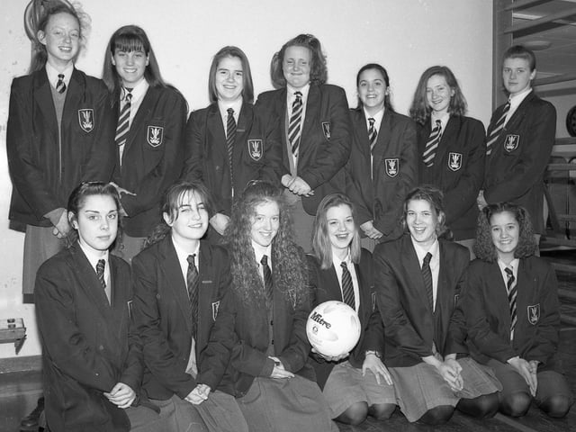 Two netball teams at Giles School, Old Leake, had cause to celebrate in early 1994. Both the under 16 and 15 teams came third in the HSSF tournaments at Boston High and Spalding High. Both were awarded the newly-created trophy for winners of the mixed schools' section. Under 16 team members were: Vicky Marshall, Vicky Young, Julie White, Lyndsey Wood, Fay Cripps, Natalie Smith, Marie Dawson, and Kerry Edwards. The under 15 team members were: Tina Griffin, Marie Dawson, Anne-Marie Hallam, Debra Dickinson, Nicola Dawson, Kerry Edwards, Lisa Sullivan and Vicky Wright. Pictured are some of the triumphant netball players.