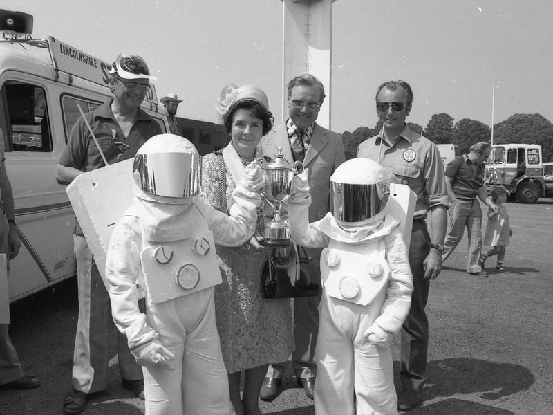 The 3rd Boston (Fishtoft) Scouts, who won the individual section trophy at Boston's Carnival, receive their prize from the Mayor, Coun Margaret Haworth. The boys' float, all in silver and white, depicted the first moon landing.