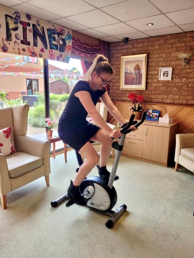 Toray Pines team member Ellie Wibberley peddling for home funds.