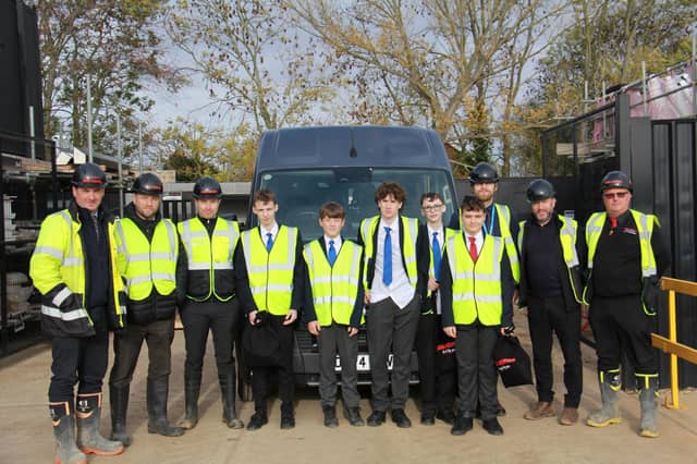 Students from Oasis Academy in Immingham received a behind-the-scenes tour of Beal Homes’ Highfields development to gain insight into the workings of a real construction site. The students are pictured with, from left, Beal team members, Wayne Edmond, Jamie Barrington, David Bennett, Simon Richardson and Jason Amies and Oasis Academy teacher, James Gill, third from right.