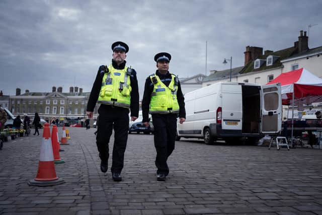 Police on patrol in Boston town centre.